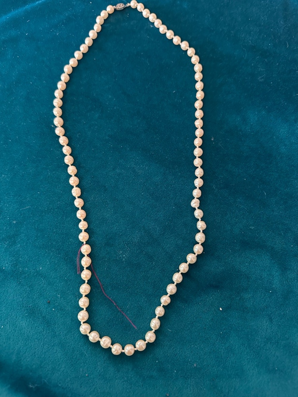 24” long pearl necklace. Like new.